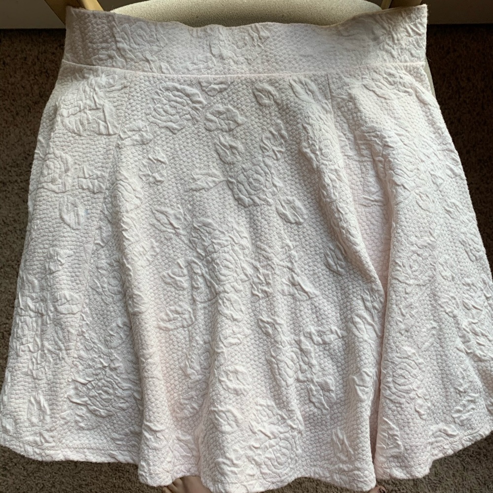 Pastel Pink Mini Skirt with Floral Detail